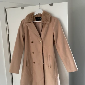 Kappa  - Kappa. Rosa/beige. Köpt för flera år sedan. Använd fåtal gånger. 