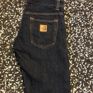 Carharrt WIP jeans, 31x32 - CARHARRT jeans, dark blue. Size: 31x32 Material: 100% cotton Original price: 1000 kr, about 95 euros My price: 650 kr or 65 euro They have been used about 5 times, perfect condition, washed 2 times, no holes or other damaging. Pretty much worldwide shipping, shipping price is added. (About 50 kr or 5 euros.) Contact me here