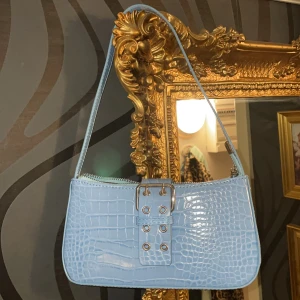 Ljusblå shoulder bag - Aldrig använd, från Shein. 
