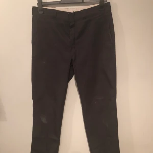 Svarta Dickies - Ett par hyfsat slitna svarta dickies
