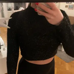 Black sparkly crop top from H&M. Never been used. Size small