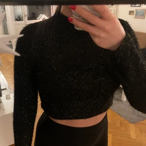 Sparkly top from H&M  - Black sparkly crop top from H&M. Never been used. Size small