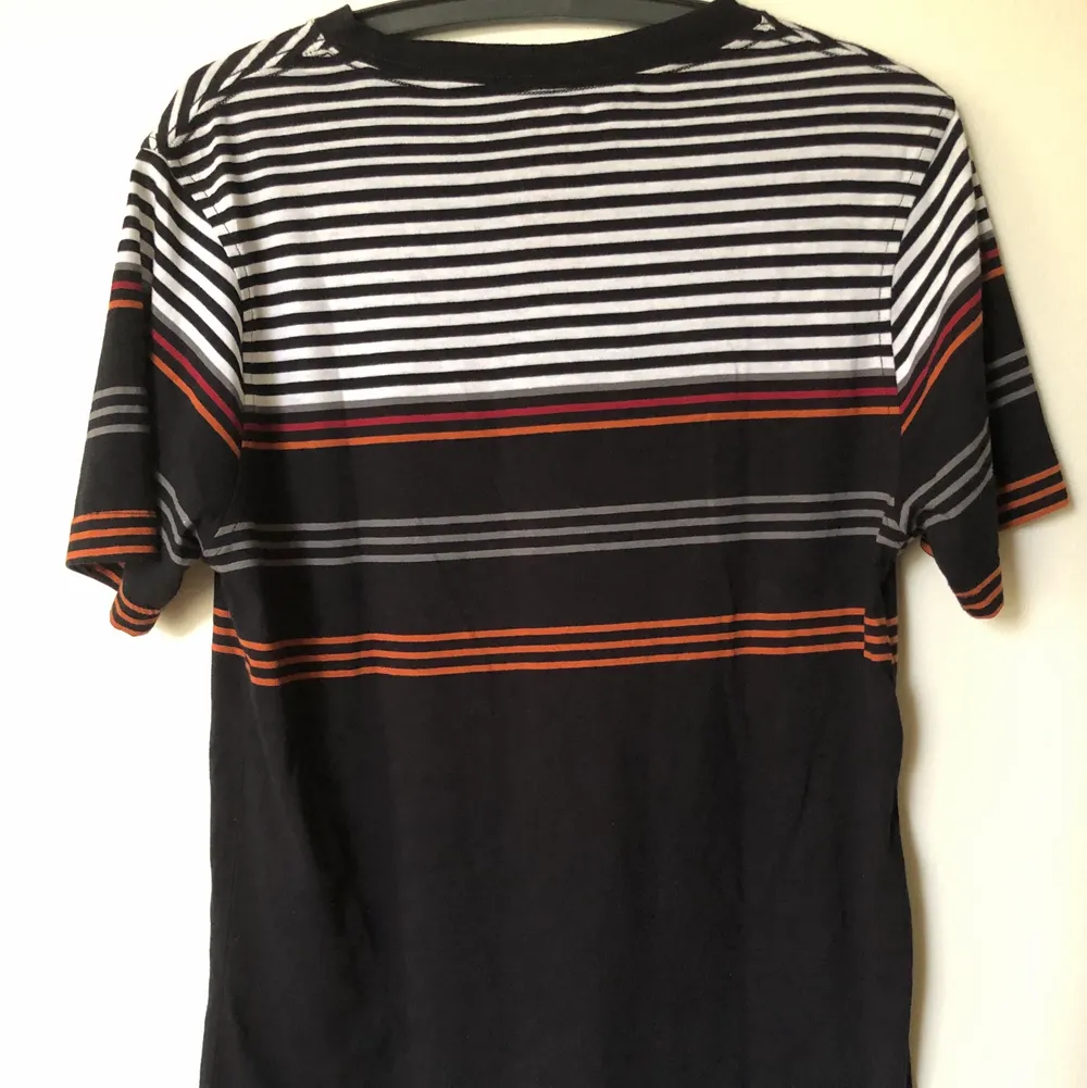 Retro 90’s Grunge Style Striped T-Shirt  Size small, fits like a regular men’s size small.  Excellent condition, no flaws or damage.  DM if you need exact size measurements.   Buyer pays for all shipping costs. All items sent with tracking number.   No swaps, no trades, no offers. . T-shirts.