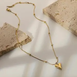Halsband med hjärta i guld, oanvänd ordinarie pris: 68 euro