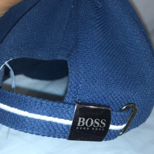 BOSS HOGO äkta  - Kepsen  är till killar men tjejer kan också ärvande den 