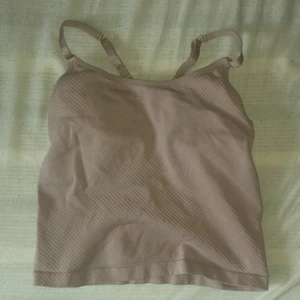 Topp  - Inte använd så mycke, En rosa gym topp