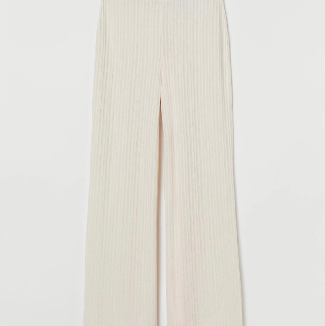 Ribbade vit/beiga byxor 