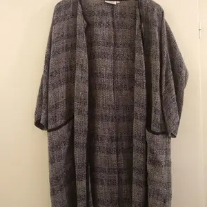 Cardigan by MASAi size small. It was bought a while ago but was used only once. Looks great on almost everything because of  it's neutral colors.