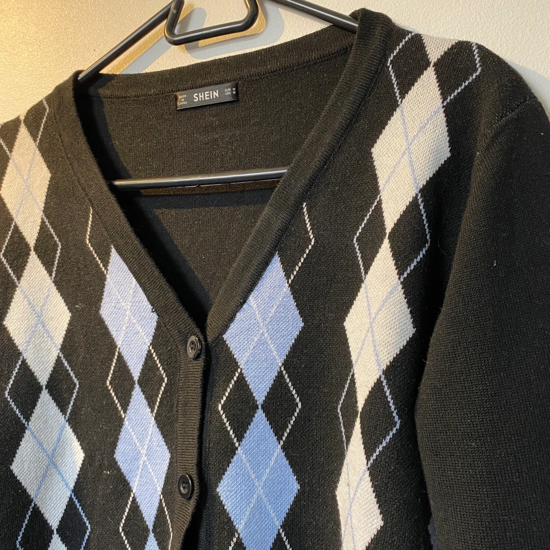 Stickad rutig kofta - 91