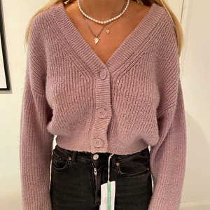 Lila kofta  - En lila super fin kofta , nästan oanvänd! 