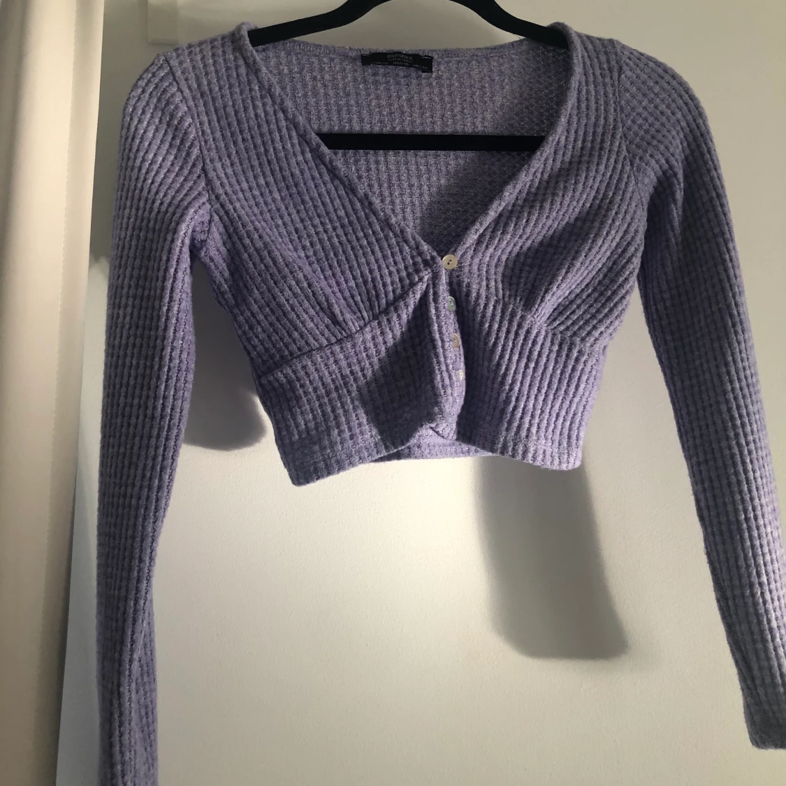 En söt kofta från bershka storlek XS