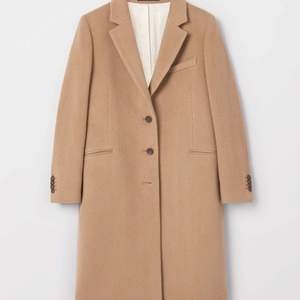Beige wool coat from Tiger of Sweden. Have only used once and selling it because it is a little big for me. Size 36