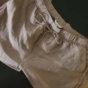 Linen blend  - Raka linnebyxor  Använda en gång  Storlek L