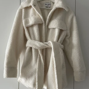 Kappa - Kort kappa från Nakd. Inte använd många gånger så den är i väldigt bra skick. 