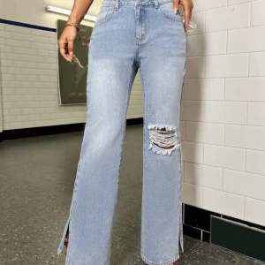 Ljus blå jeans  - Helt nya blå jeans. 