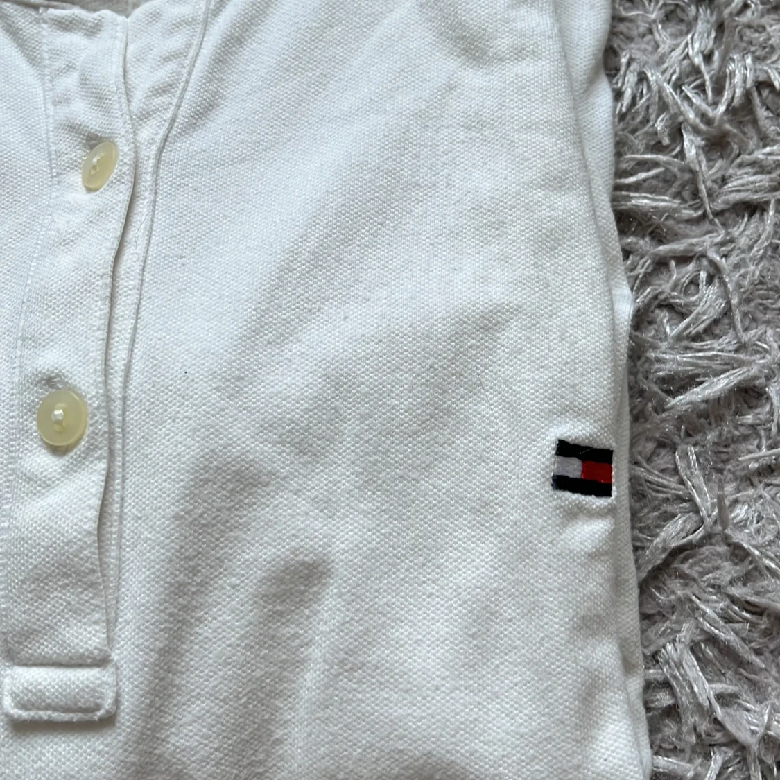 Tommy Hilfiger  - 91