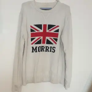 Vit stickad tröja av märket Morris. Knappt använd.