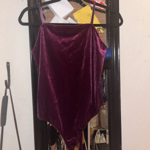 Body - Söt body i mjukt material. 