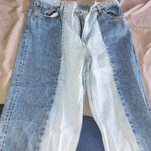 2 coloured jeans. - Worn a couple times but in great condition!