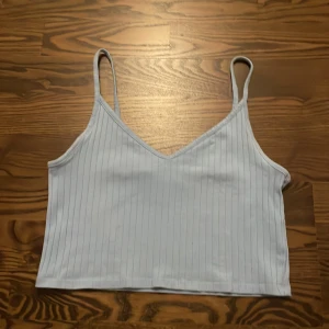 Ljusblått Linne  - Ljusblått linne från H&M. Som ny. 