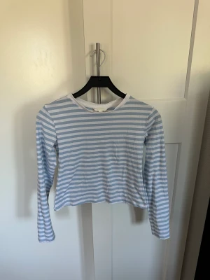 Topp - En topp i kortare och tightare modell