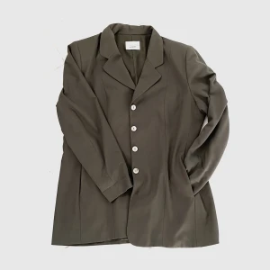 Oanvänd Kavaj - Vintage Kavaj i nytt skick med diskreta fickor. 