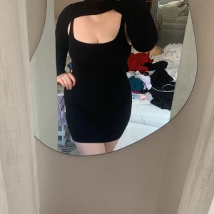 Klänning - Två delad stickad klänning från paralell lines.