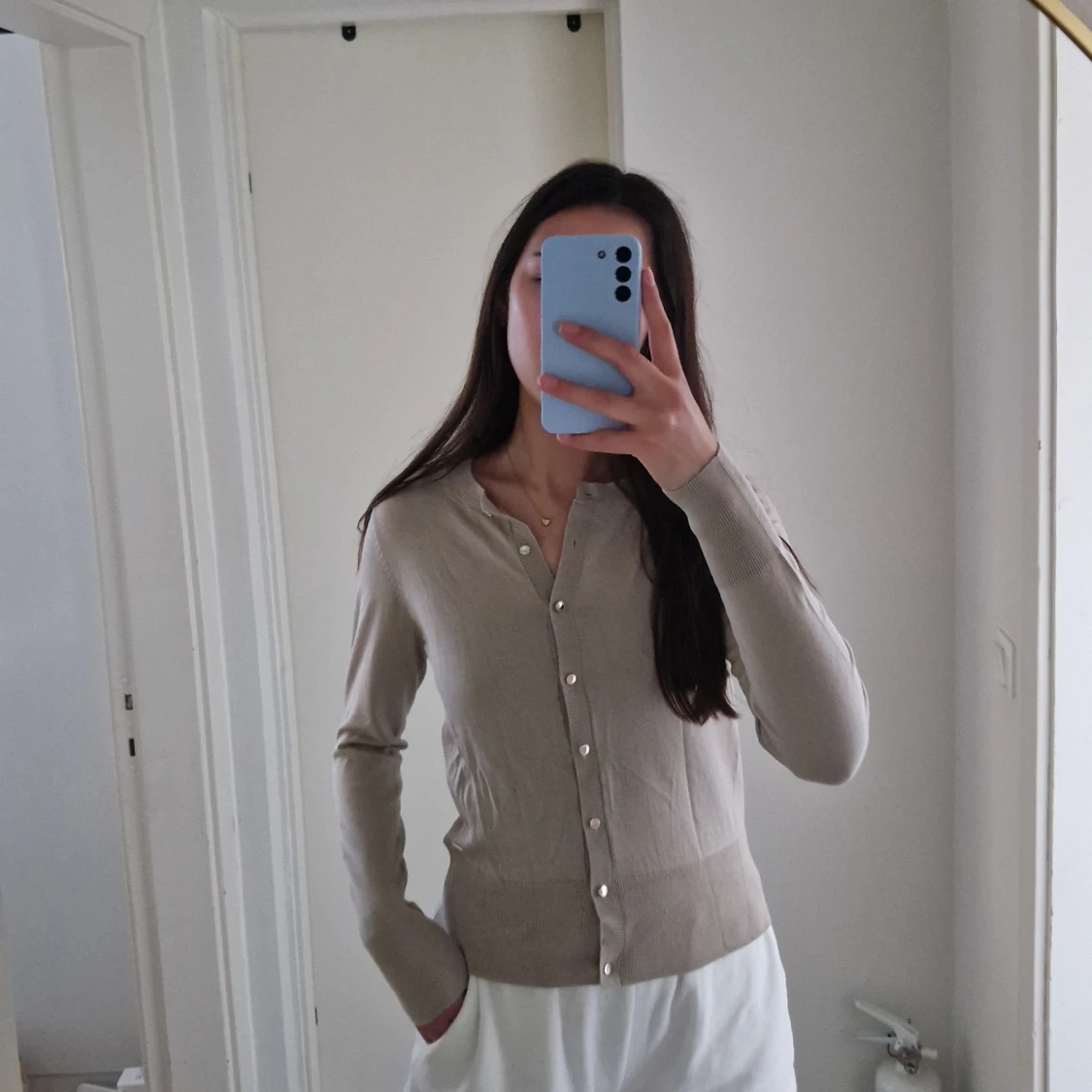Finstickad cardigan
