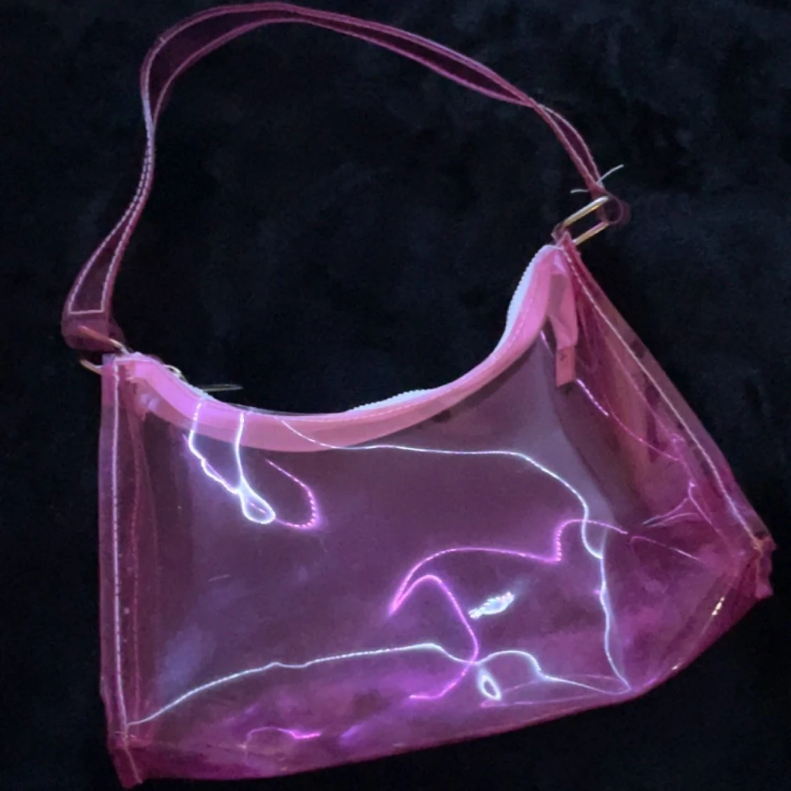 Rosa genomskinlig väska