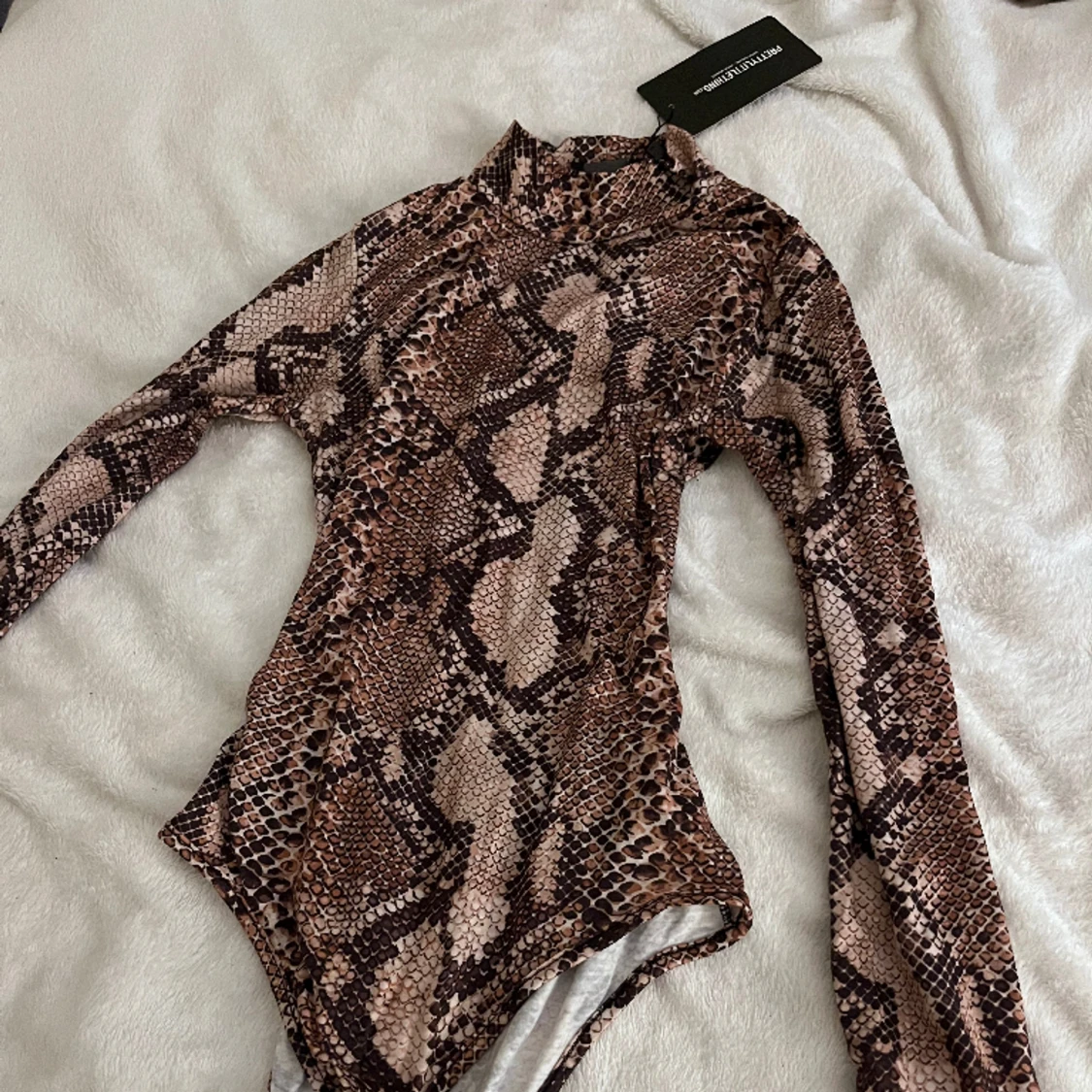 Bodysuit ormmönster - 90