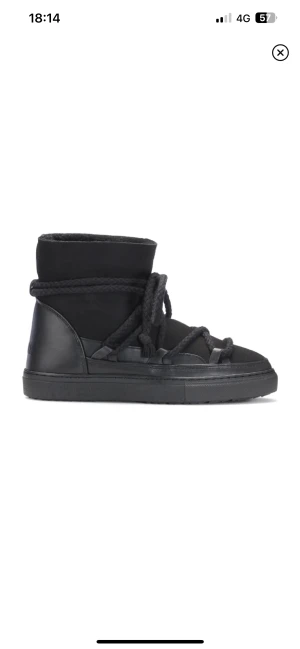 Inuikiis - Svarta vanliga Inuikiis, köpte på plick, är endast använda en vinter så de är i bra skick