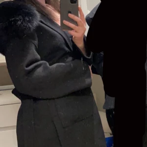 Svart kappa - Svart kappa