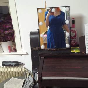 Blå lång klänning