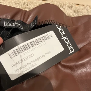 Läderbyxa  - Brun/röd läderbyxa storlek 6 helt ny  