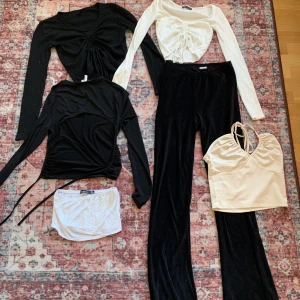 BASIC KLÄDPAKET 4 - ALLT INGÅR💞 GINA TRICOT svart snörtröja strlk XS, ZARA vit snörtröja strlk S, JDY byxor strlk S skriv för innerbenslängd, NLY TREND beige strlk S, NLY TREND svart öppen rygg strlk XS, BOOHOO tubtopp strlk 36