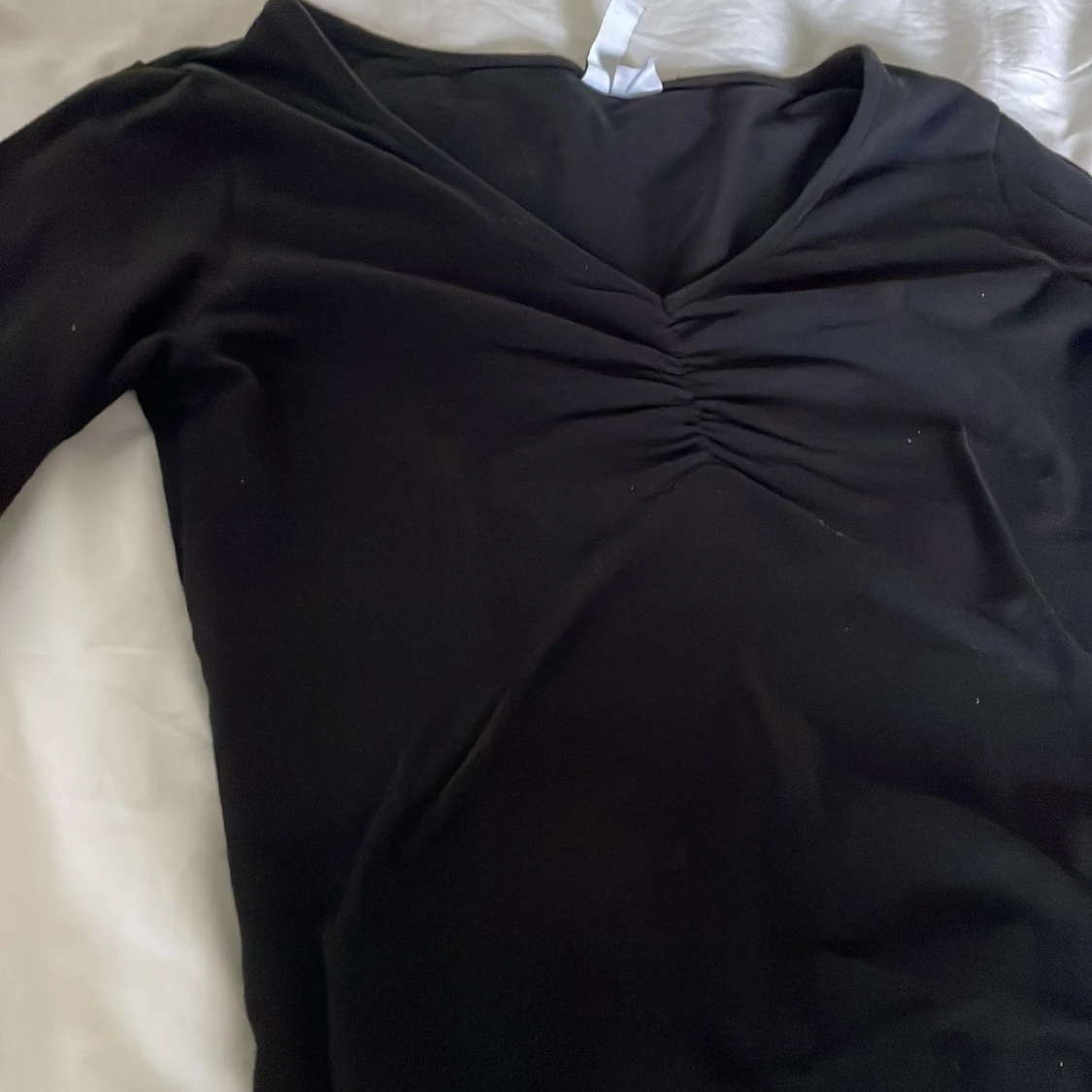 Långarmad tröja med detalj vid brösten  - 91