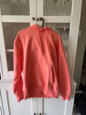 Hoddie - Färgglad hoodie, korall färgad