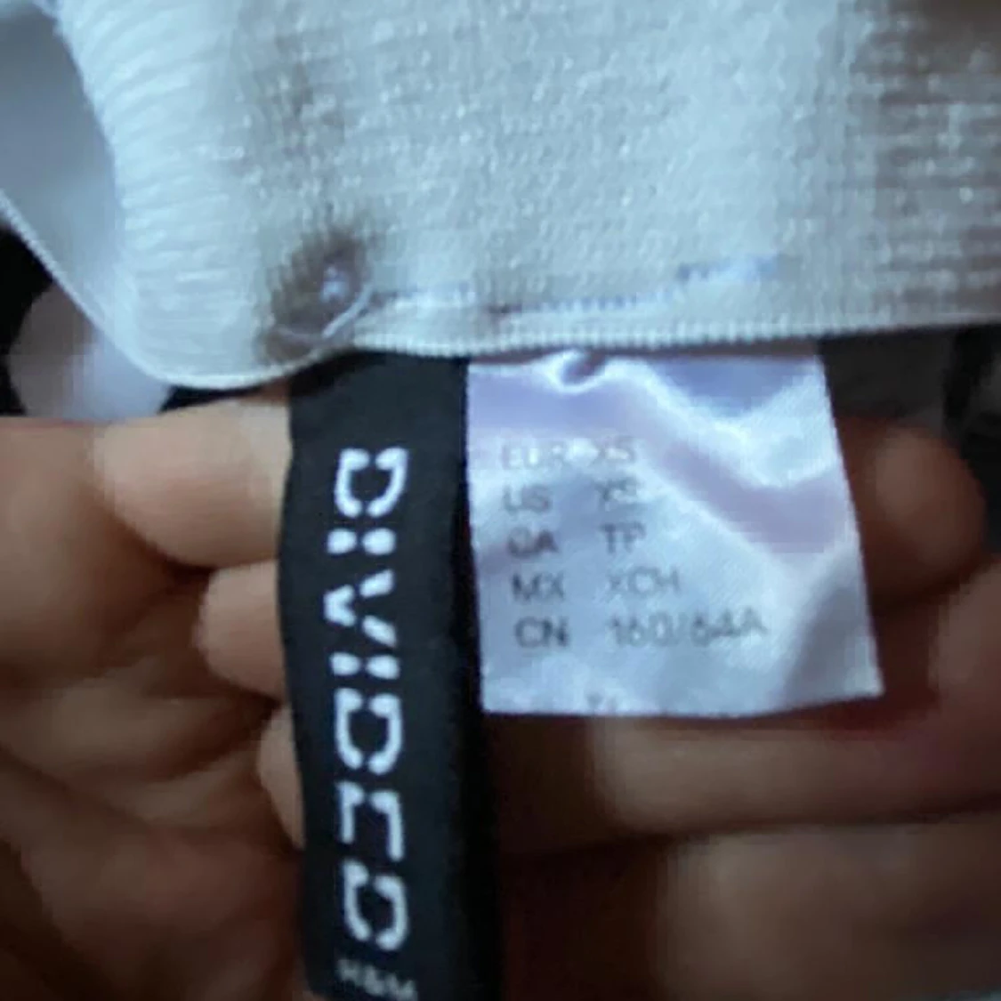 Rutiga bootcut byxor - 90