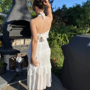 Set - Ett super gulligt set med kjol som underdel och en croppad topp. Materialet är tunnt vilket är skönt till sommaren