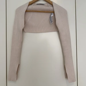 Beige bolero - Beige supersnygg bolero