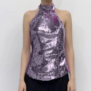 Paljett topp - Topp från zara. Mycket fin. Det är halterneck så den är öppen i ryggen. Aldrig använd, prislapp finns. 