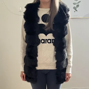 Pälsväst - Pälsväst från cherry koko i strl s/m