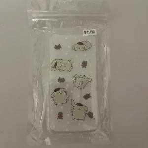 Purin skal - Helt nytt och oanvänt genomskinligt Purin skal som passar iPhone 11 Pro. Köptes från kawaii shop i Göteborg och säljer för jag köpte fel storlek. Nypris 99kr säljer för 30kr+frakt
