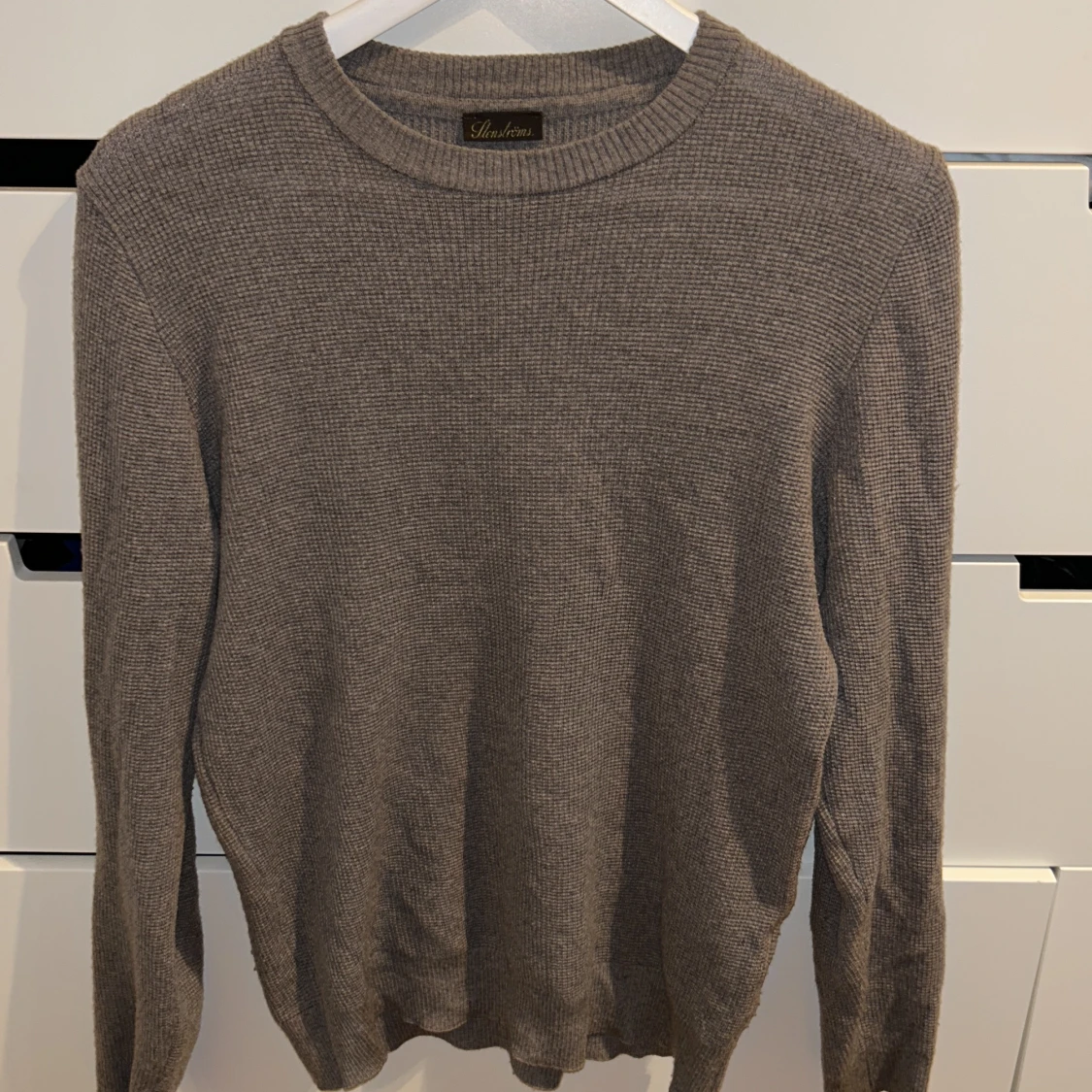 En grå/brun tjocktröja i 100% merinoull från Stenströms i strl L. - 90