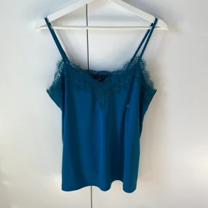 Grön/blått linne - Grön/blått linne från newyorker, aldrig använt. Stl M