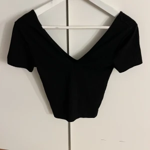 T-shirt  - T-shirt i storlek xs.