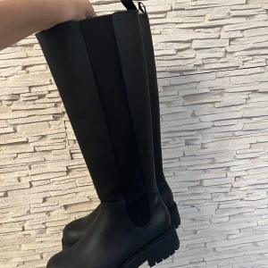 Stövlar  - Använda en gång som nya