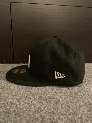 New era keps  - New era keps i storlek 56,8