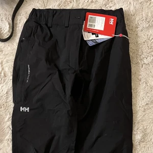 Regnställ - Oanvända med prislapp 