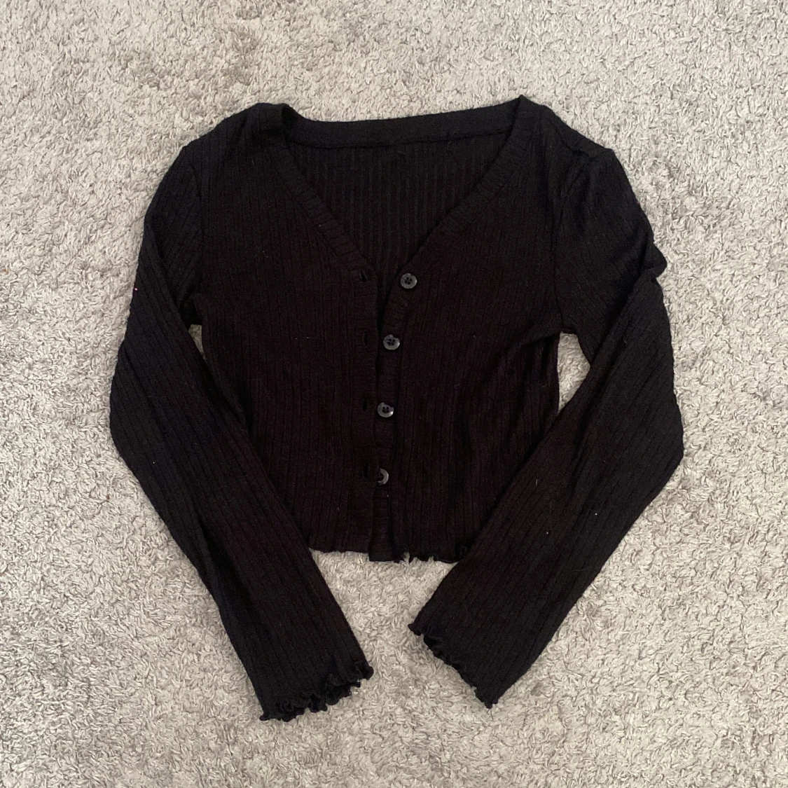 Svart ribbad koftađ€